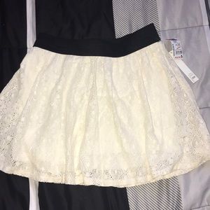 cream colored laced flowy skirt